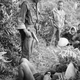 Captured Vietcong wait for interrogation, 1962